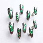 KATSEYE Gnarly High-Gloss Chrome Nails