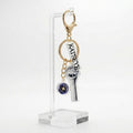 KATSEYE Golden Identity Keyring